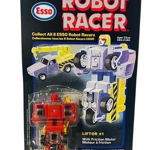 May include: A red and yellow toy robot truck, called "Liftor #1", transforms into a robot. The toy is part of the Esso Robot Racers collection. The packaging features a blue and white robot truck transforming into a robot.