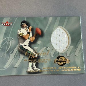 Mark Brunell Match Begagnad Sliten Tröja Tygmärke 2000 Fleer Jaguars Feel Match Insert Sp