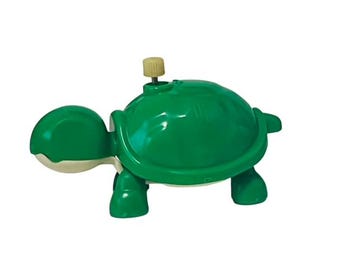 ビンテージ ゼンマイ式おもちゃ 子供 赤ちゃん 時計 トミー イルカ