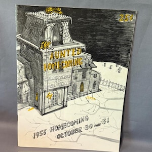 May include: Vintage Halloween poster featuring a haunted house illustration. The poster reads "Haunted Homecoming" with "Colorado vs Iowa State" and "1953 Homecoming October 30 and 31". The price is 25¢. The artwork is in black, white, and yellow.