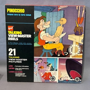 May include: A vintage GAF Talking View-Master Reels box featuring Pinocchio. The box has a black and white panel with the text "PINOCCHIO" and "TALKING VIEW-MASTER REELS". The box also has illustrations of Pinocchio and other characters from the story.