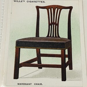 May include: A mahogany chair with a brown upholstered seat and a decorative back. The chair is featured on a card with the text "WILLS'S CIGARETTES." and "MAHOGANY CHAIR."