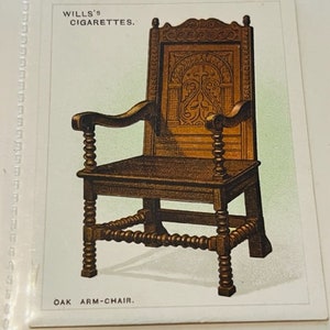 May include: A vintage Wills's Cigarettes advertisement featuring a detailed illustration of an oak arm-chair with intricate carvings and turned legs.