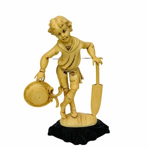 ROMAN FONTANINI FIGURINE Depose Italy resin bakelite sculpture Italian art people vintage antique 1960s vtg Boy Shovel hat
