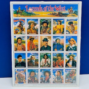 CARTOON ANIMATION STAMPS vintage ephemera sheet vtg pop culture retro cowboy western legends of the west wyatt earp bill hickok annie oakley
