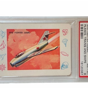 Planes Trains Ships Cars Automobiles Trading Collectors Card 1958 Cardo Trading Leaf Guild Graded Mint PSA 8 Mig Fighter USSR T13 jet