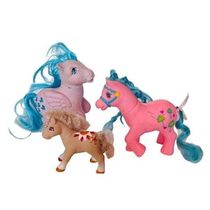 My Little Pony Mixed Lot 1980s Hasbro ponies purple pegasus flutter flower tan