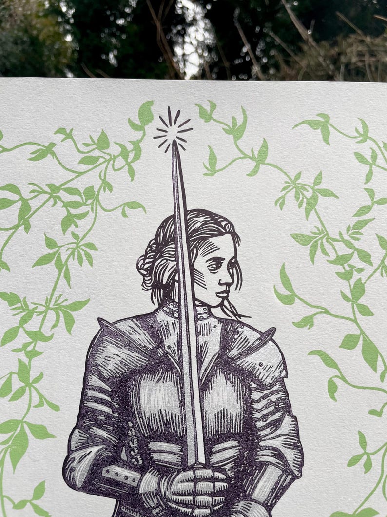 May include: A black and white illustration of a person in armour holding a sword. The person is surrounded by green vines.