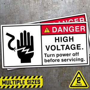 May include: Two white warning signs with red borders and black text. The signs read "Danger High Voltage. Turn power off before servicing." The sign on top has a lightning bolt and a hand with a wire wrapped around it. The sign on the bottom has a yellow exclamation point. The signs are on a grey textured background. The text "Multiple Sizes" is printed on a yellow and black striped banner below the signs. A yellow triangle with black text reads "2 Pack" below the banner.