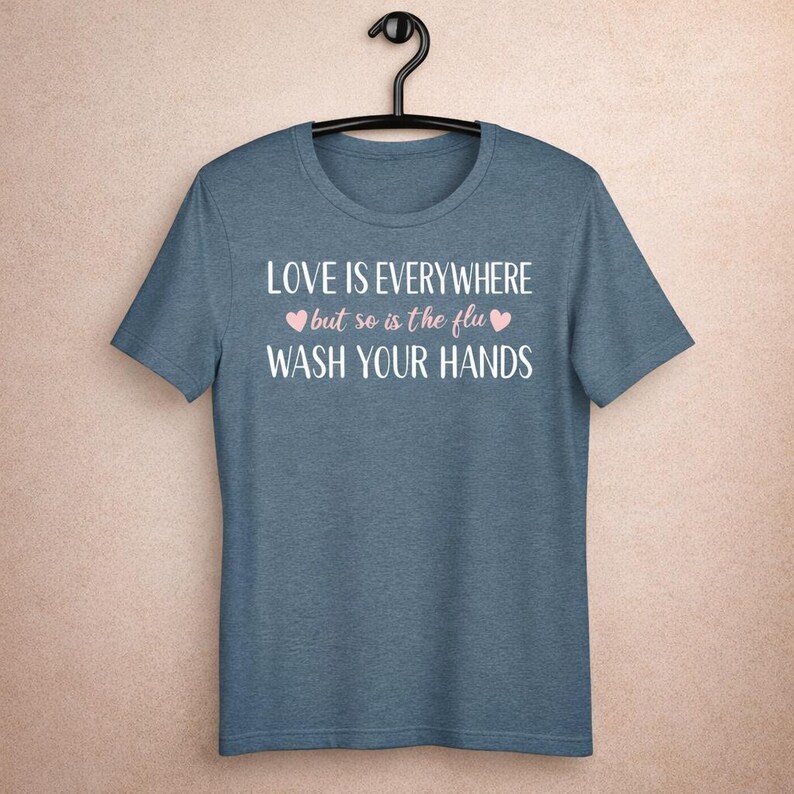 Funny nurse shirt love is everywhere but so is the flu wash your hands design on blue bella canvas tee