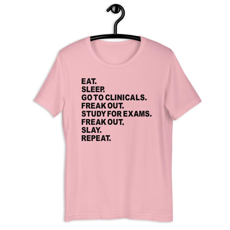 Light pink nursing student gift shirt clinical rotation humor tee