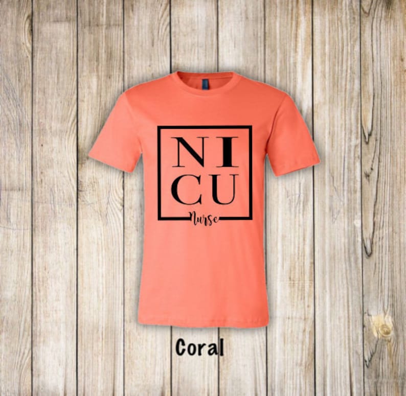 May include: Coral colored t-shirt with black text that reads "NICU Nurse" in a square frame.