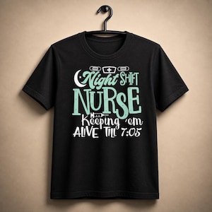 May include: Black t-shirt with the words "Night Shift Nurse" in white and teal lettering. The shirt also includes the phrase "Keeping 'em Alive Till 7:05". The design features a nurse's cap, a crescent moon, and a syringe.