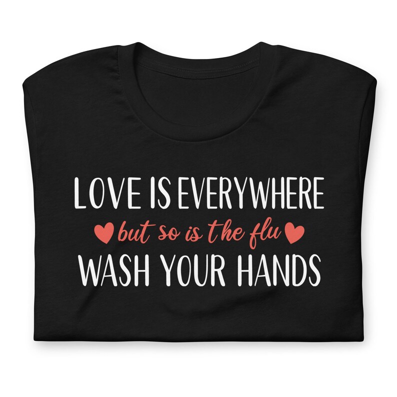 Funny nurse humor shirt love is everywhere but so is the flu design on black tee