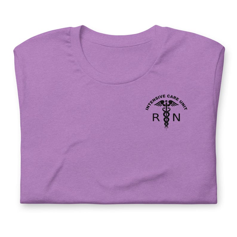 Folded heather purple ICU nurse shirt with black critical care RN chest design.