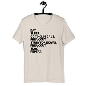 Cream nursing school humor shirt funny clinicals survival graphic