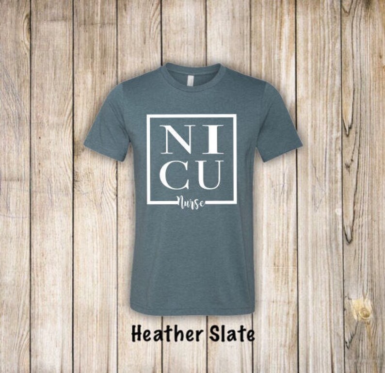May include: A heather slate blue t-shirt with a white square graphic that says "NICU Nurse".