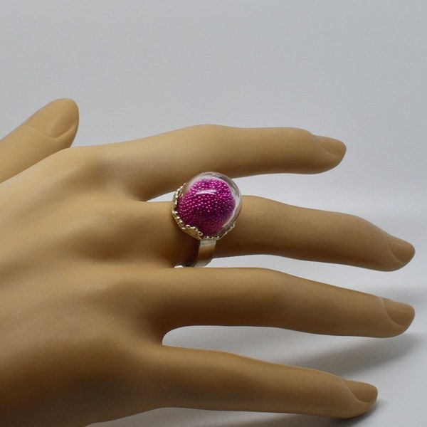 Bague plateau avec un globe rempli de micro bille rose