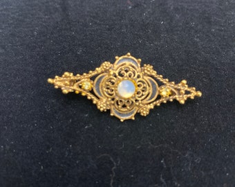 Broche vintage dorado Florenza