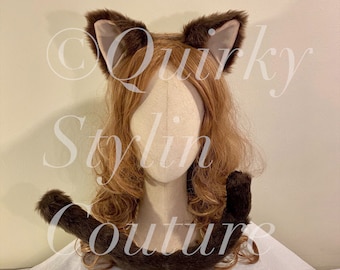 May include: Brown faux fur cat ears and tail headband set. The ears are pointed and the tail is long and fluffy.