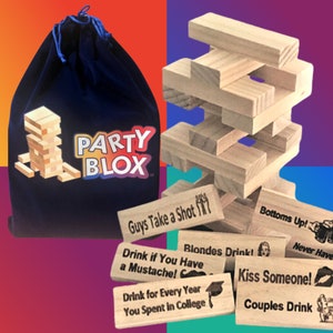 party blox drinking tower game with phrases and clip art engraved pictures such as guys take a shot couples drink includes velvet drawstring bag with party blox logo  adult party game adult sex game bedroom game bedroom games couples game erotic gift