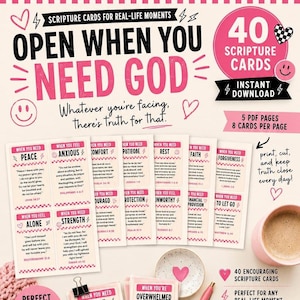 May include: A set of 40 scripture cards for real-life moments, featuring pink and black text on white paper. The cards include phrases like Open When You Need God, with themes such as peace, anxious, comfort, rest, faith, and strength.