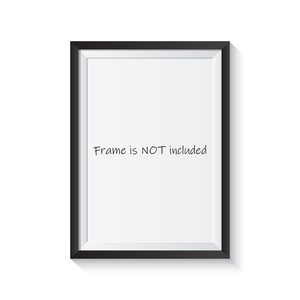 Op de afbeelding: Een zwarte rechthoekige fotolijst met een witte binnenkant. De tekst "Frame is NOT included" is in zwarte cursieve letters in het frame geschreven. De lijst staat op een witte achtergrond.