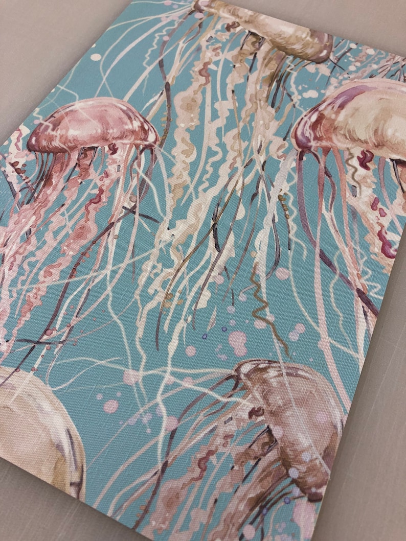 May include: A watercolor painting of jellyfish on a teal background. The jellyfish are pink and brown with long tentacles. The painting has a whimsical and abstract style.