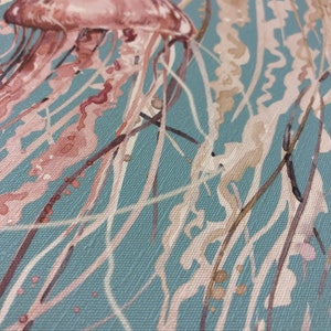 May include: A watercolor painting of a pink jellyfish with long tentacles against a blue background.