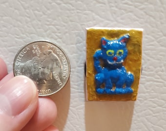 Refrigerator Magnet of A Blue Phabrisaur Cat from Unphoundland