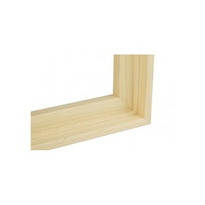 May include: A close-up of the corner of a natural wood picture frame. The frame is made of solid wood with a light, natural finish.
