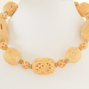 extraordinary carved bone beaded necklace