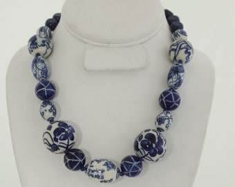 assorted shapes and sizes of blue and white Chinese porcelein beads