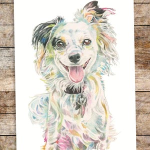 May include: Watercolor painting of a white dog with black and brown markings. The dog has a happy expression with its tongue sticking out. The painting is done in a colorful style with shades of pink, blue, green, and yellow.