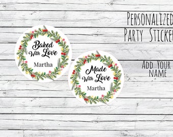 May include: Two round personalized party stickers with a wreath design. One sticker says "Baked with Love Martha" and the other says "Made with Love Martha".