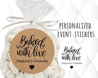 May include: Two round brown and white stickers with the text "Baked with love Jessica's Snacks" and a small black heart. The stickers are for personalized event use.