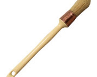 May include: A wooden-handled paint brush with a pointed tip and natural bristles. The brush has a copper ferrule.