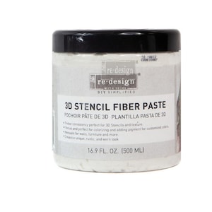 May include: A white plastic jar of 3D Stencil Fiber Paste by re-design with Prima. The jar is labeled with the product name, instructions, and a 16.9 fl oz (500 ml) size.