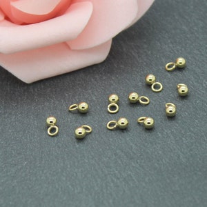 10 zawieszek w kształcie kulek z pozłacanej stali nierdzewnej 304, 6 x 3 mm, AC160