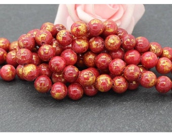 20 perles de jade Mashan 8 mm coloris rouge et poudre d'or PEJ207