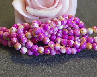 x40 4mm ocean jade beads tinted pink, yellow and white PG422