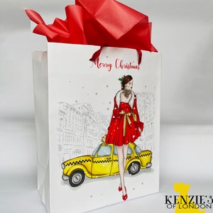 NYC TAXI FASHION Christmas Gift Bag | Holiday Wrapping Paper Tote | Woman Shopper Mrs. Claus Rockefeller Center Nyc