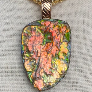 Ammolite Pendant - Rugged Stone in Peachy Tones!  Color Changer!  Please Read Description