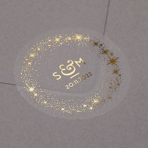 Celestial Wedding stickers. Foiled personalised initials and date wedding labels. Semi clear matt envelope seals. Star stickers