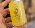 Personalised Limoncello Labels for Wedding Favors | Clear Oval Custom Gold Foil Stickers product logo
