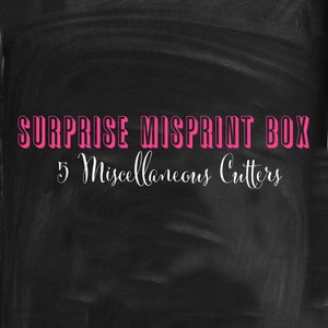 May include: A black chalkboard background with the text "SURPRISE MISPRINT BOX" in pink, and "5 Miscellaneous Cutters" in white script. The text is centered, and the overall design is simple and eye-catching.