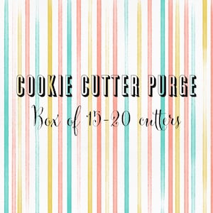 May include: A graphic image featuring vertical watercolor stripes in shades of peach, teal, and yellow. The text COOKIE CUTTER PURGE is displayed in a bold, black, sans-serif font, followed by the script text Box of 15-20 cutters in black.