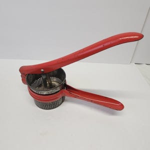 Vintage 1950&#39;s Metal Potato Ricer With Red Handle & Frame Masher Strainer