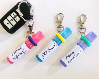 Mini spray bottle key chain kit- hand sanitizers holder - perfume- fragrance- room spray- bug spray- EMPTY- travel sized