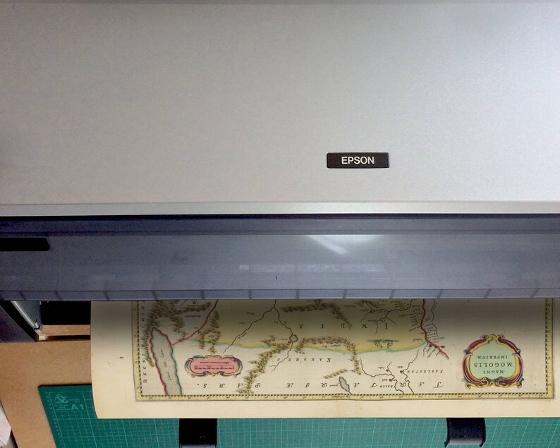 May include: A vintage map of the region of Visigothic Spain, titled "Waisneri Visigothorum Regnum", is being scanned on a flatbed scanner with an Epson label.